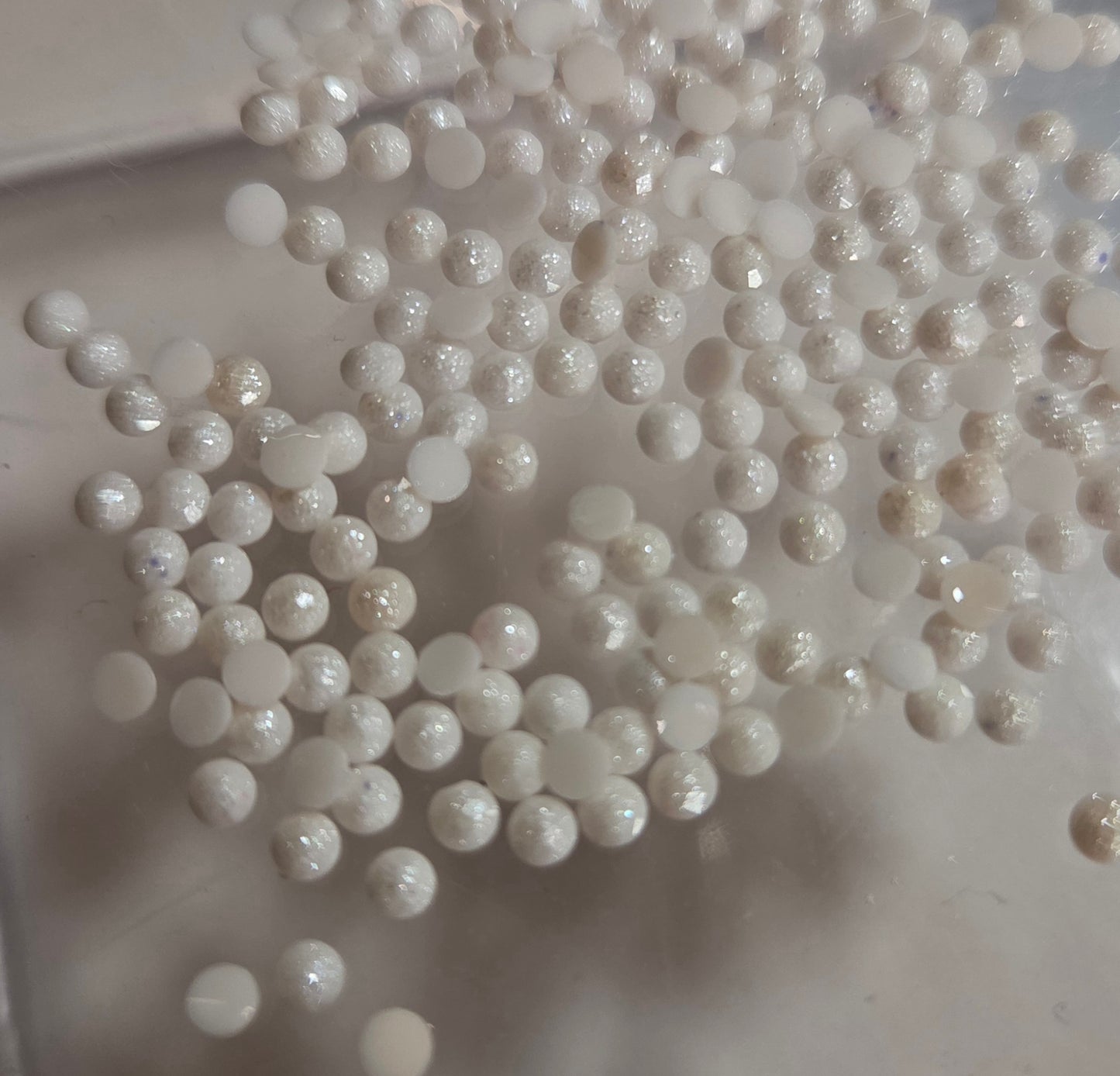 DMC 819 Round Fairy Dust Drills for diamond painting embellishment to add the bling to bland.