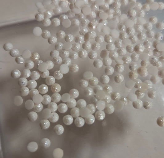 DMC 819 Round Fairy Dust Drills for diamond painting embellishment to add the bling to bland.