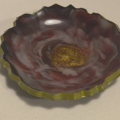 Containers that are utilitarian -- bottles, bowls, boxes, jars and cups -- and bring the bling